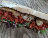 Foto del paso 4 de la receta: Pollo al pastor con lechugas morada y verde con piña asada