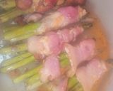 A picture of step 5 of Cheesy Bacon-Wrapped Asparagus Twisters.