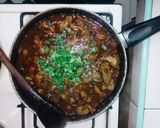 A picture of step 13 of Gizzard with rice and greens.