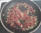Foto del paso 3 de la receta: Guisantes con jamón