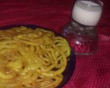 A picture of step 8 of Jalebi with hot milk.