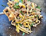 A picture of step 6 of Stir-fry ground pork with bamboo shoots mushroom and basil.