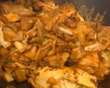 A picture of step 5 of Char Keow Teow with beef gravy.