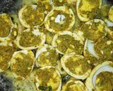A picture of step 4 of Masala eggs.