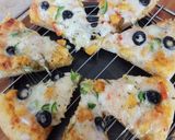 A picture of step 4 of Chicken Tikka Pizza 🍕🧀🍕.