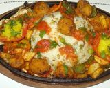 A picture of step 3 of Rice sizzler with tomato coulis.