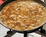 A picture of step 6 of Paella with Prawns.