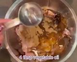 A picture of step 3 of Chicken wrapped in fragrant pandanus leaves. (Pandan Chicken).