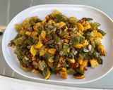 Une image de l'étape 14 de Courgettes jaunes, tomate noire et poivrons verts aux épices.