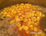 A picture of step 7 of Chicken, Mushroom, and Corn Congee.