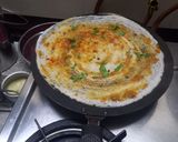 A picture of step 1 of Schezwan pav bhaji dosa.