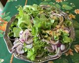 Une image de l'étape 7 de Salade feuille de chêne à l'oignon rouge, mimolette vieille et persil.