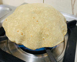 A picture of step 4 of Ragi Matar Roti with a hint of Kasoori Methi.