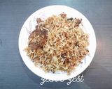A picture of step 9 of Hyderabadi Kachchi Aqhni Chicken Dum Biryani.