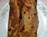 A picture of step 8 of Wholegrain chapati with onion and coriander.
