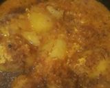 A picture of step 8 of Paneer stuffed potatoes in masala gravy.