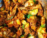 A picture of step 13 of Kathal Masala.