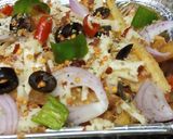 A picture of step 6 of Chessy pizza fries.