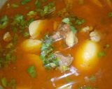 A picture of step 7 of Aloo gosht.