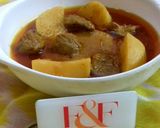 A picture of step 4 of Aalu Gosht.