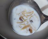 A picture of step 3 of Jawe ki Kheer with Dry fruits.