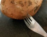 A picture of step 1 of My Sweet jacket Potato & Caralmerised Onion & Cheese.😁.