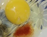 A picture of step 1 of Scrambled egg.