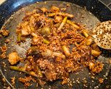 A picture of step 5 of Black Rice with Cuttlefish, Artichokes, Shrimp, and Green Garlic.