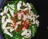 A picture of step 5 of French beans chicken and veg fried rice.