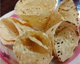 A picture of step 6 of Papad Cone Chatpati bhel puri.