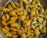 A picture of step 2 of Amla Pickle.