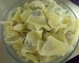 A picture of step 2 of Crispy fried wontons.