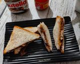 A picture of step 4 of 5 minute Peanut Butter & Nutella Sandwich.