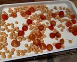 A picture of step 2 of Halloumi with pesto, balsamic tomatoes, spinach and chickpeas.