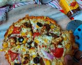 পনির টিক্কা পিজ্জা(paneer tikka pizza recipe in Bengali) রেসিপি ধাপ - 7 ছবি