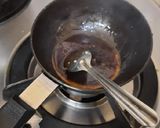 A picture of step 4 of Christmas special eggless plum cake.