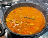 Une image de l'étape 18 de Poulet aux carottes, épices et lait de coco.