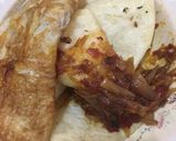 A picture of step 2 of Fried yam,egg with onion sauce.