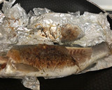 Foto del paso 10 de la receta: Lubina al papillote con tomate seco(en sartén) y aliño de patata hervida en vinagreta de orégano