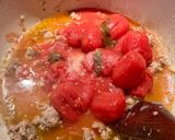 A picture of step 4 of Malloreddus alla Campidanese (pasta with saffron, tomato and pork sausage ragù).