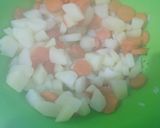 Foto del paso 4 de la receta: Ensalada de arroz, papa, zanahoria y pollo