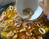 Foto del paso 14 de la receta: Patatas con langostinos y calamares