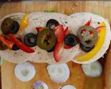 A picture of step 3 of Homemade Chicken Salami sandwich in Subway style.