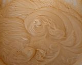 A picture of step 7 of Carrot cake with no icing.