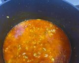 A picture of step 8 of Corn and beans palm oil rice.