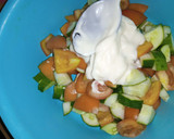 A picture of step 1 of Tomotoes and cucumber salad.