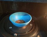 A picture of step 2 of Microwave Spicy Amla Pickle.