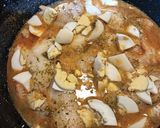 Foto del paso 9 de la receta Filetes de merluza en salsa de gambas