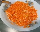 A picture of step 4 of Colorful Salad with White Rice, Carrots, Peas, Tomato, Radishes, and Cilantro.