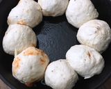 A picture of step 5 of Cheesy garlic bread meatball ring.
